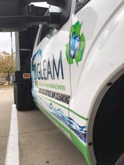 A GLEAM Branded Truck from the side